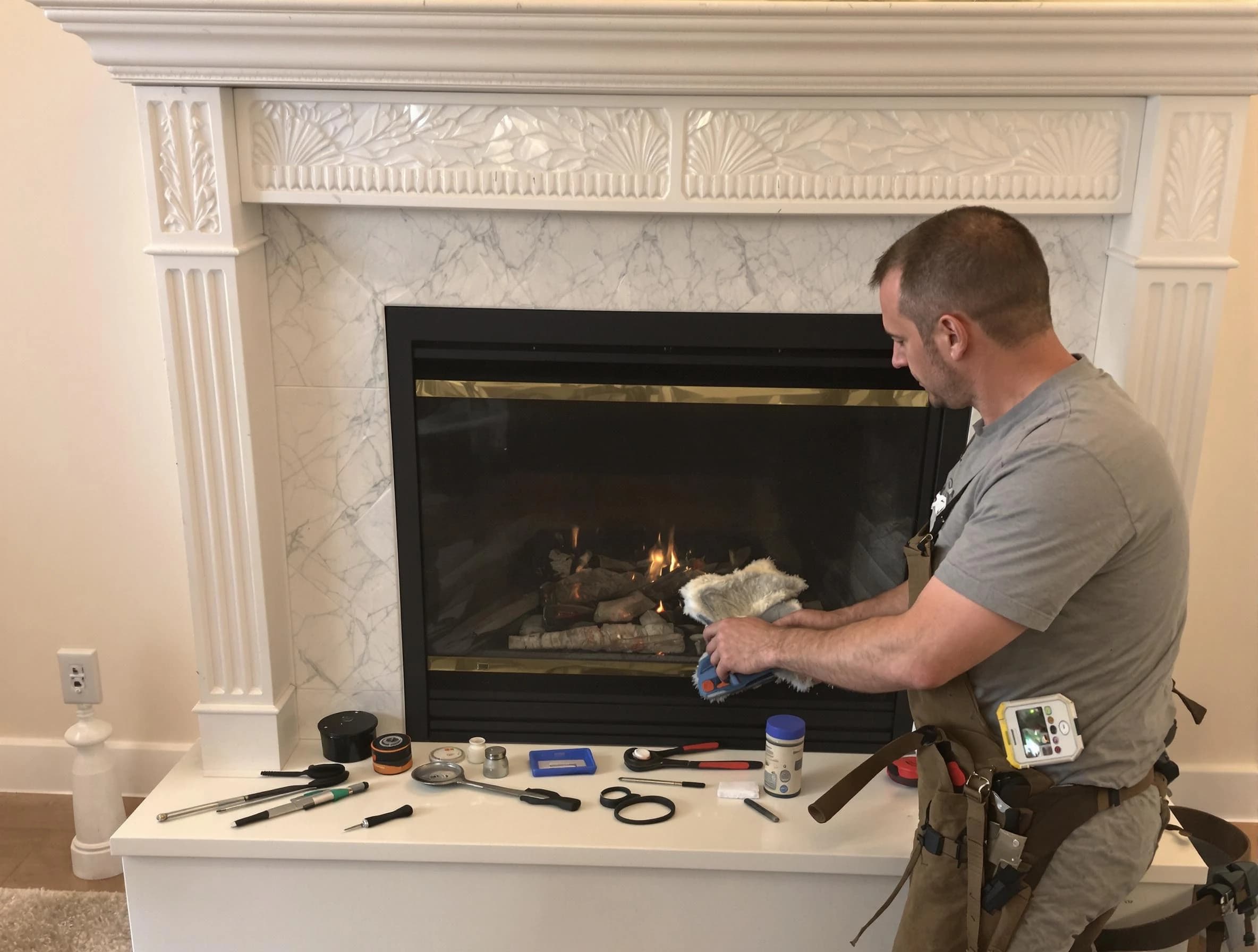 Collier Chimney Sweep performing fireplace maintenance in Collier, PA